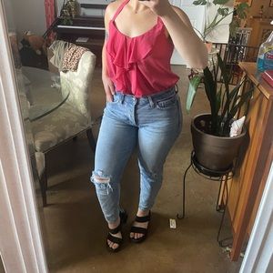 Lauren Conrad pink polyester sleeveless blouse.